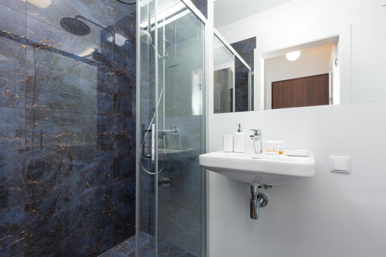 Royal City Center Mennica Residence By Noclegi Renters Varsó Kültér fotó